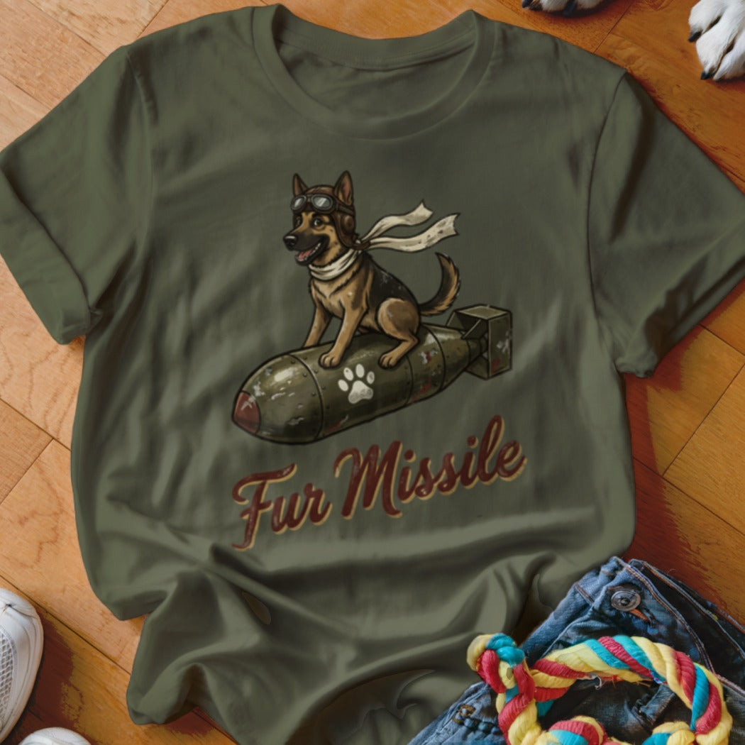 German Shepherd wearing goggles and scarf riding a bomb with "Fur Missile" text.