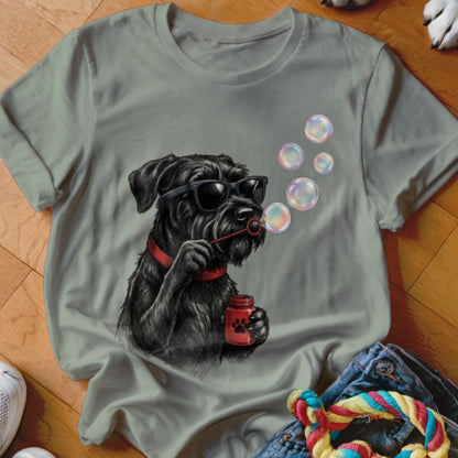 Sage green crewneck t-shirt featuring a graphic of a black dog wearing sunglasses and blowing bubbles.
