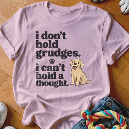 Pink t-shirt with text "i don't hold grudges. i can't hold a thought." and a dog illustration.