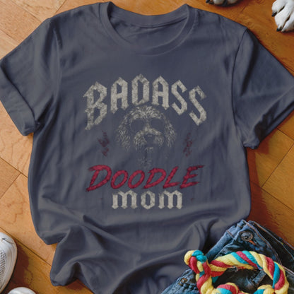 Dark blue t-shirt with distressed graphic "Badass Doodle Mom" and dog illustration.