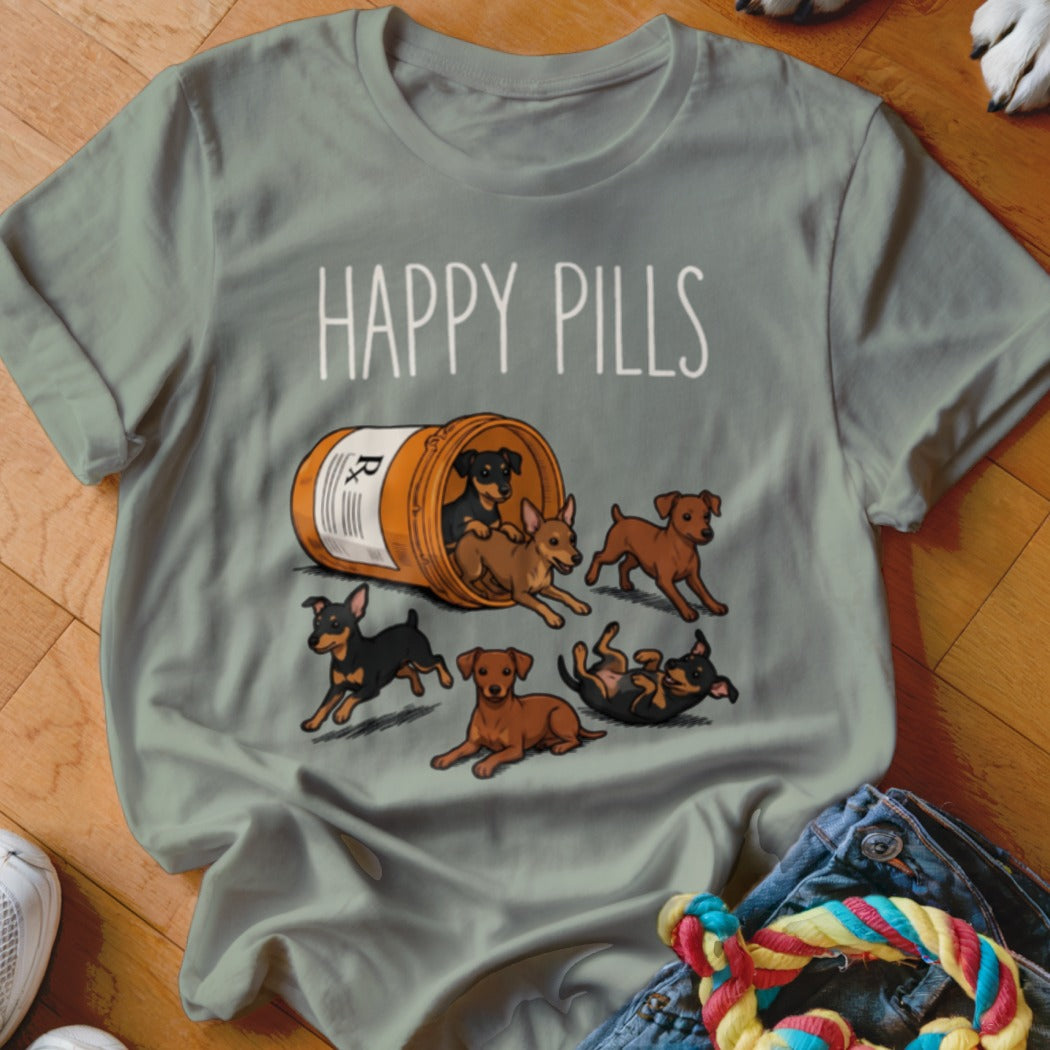 T-shirt with "Happy Pills" text and cartoon dogs spilling from a prescription bottle.