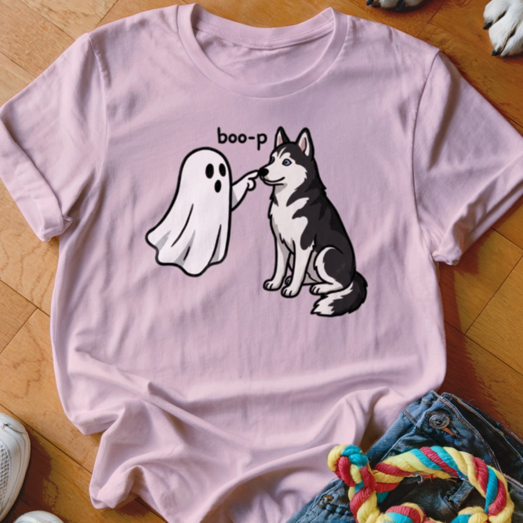 Pink t-shirt with a ghost booping a husky dog.