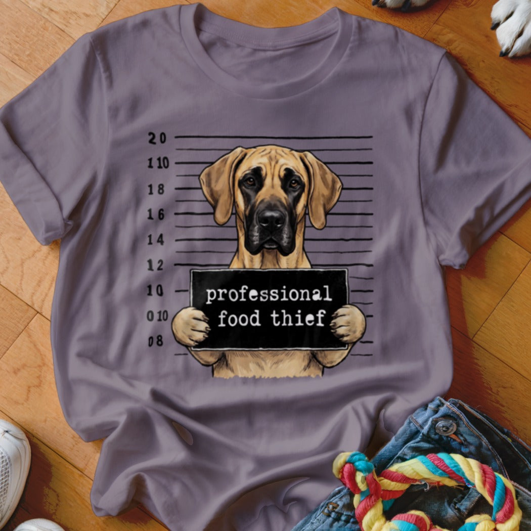 Great Dane mugshot with sign reading "professional food thief".
