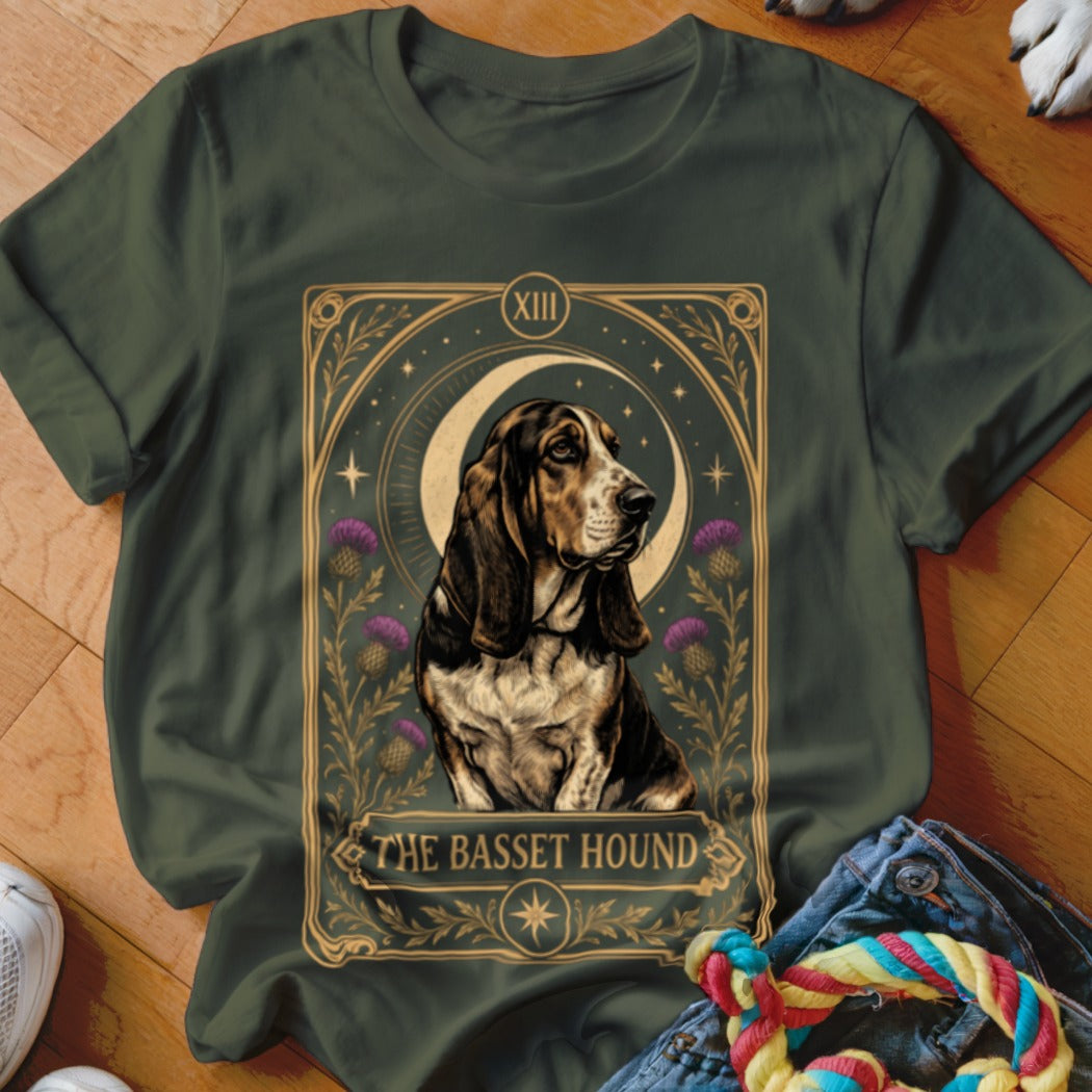 Dark green t-shirt featuring a tarot card style graphic of a Basset Hound.