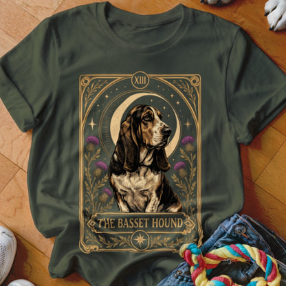 Dark green t-shirt featuring a tarot card style graphic of a Basset Hound.