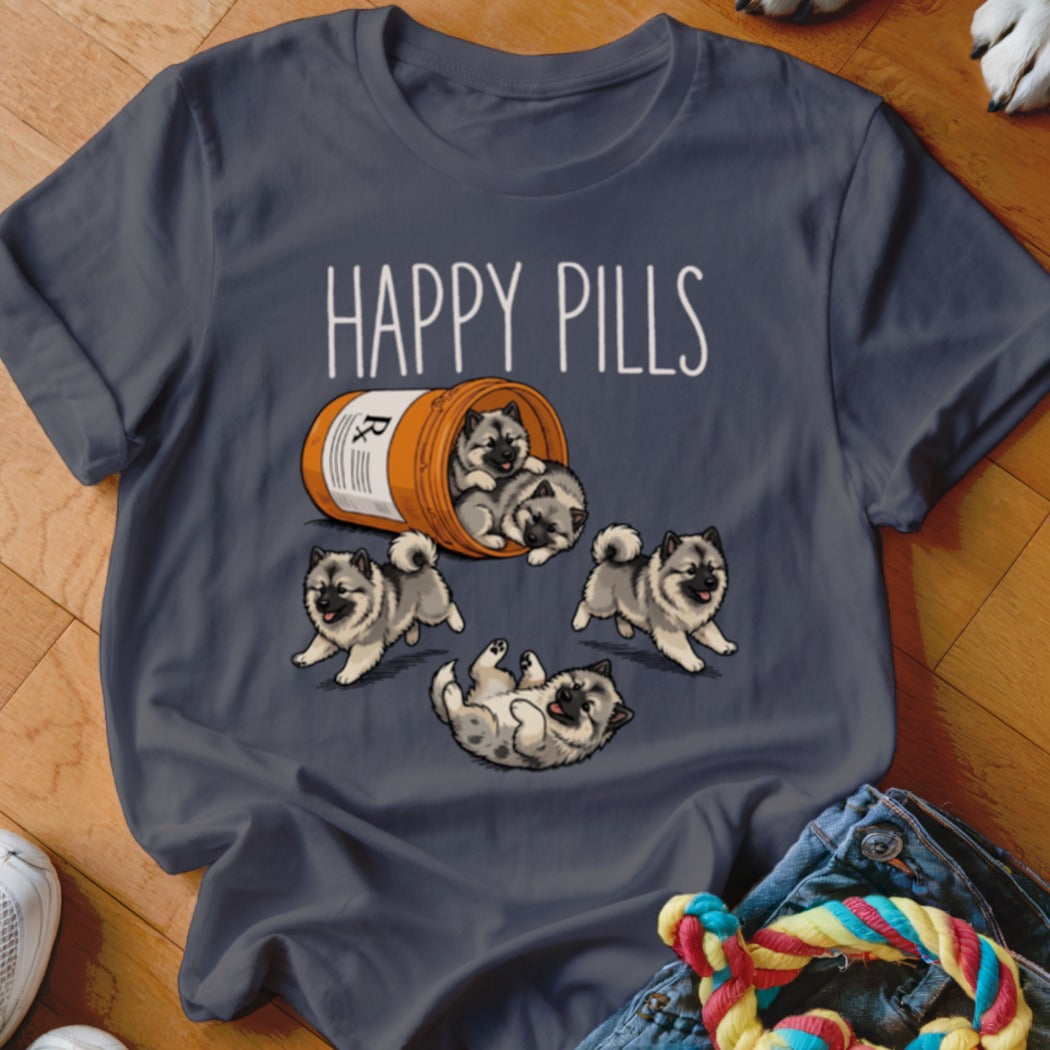 Grey t-shirt with "Happy Pills" text and fluffy puppies spilling from a prescription bottle.