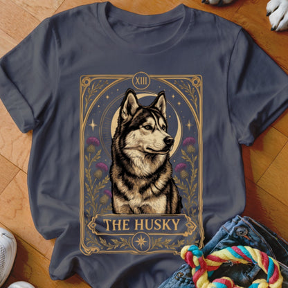 Dark gray t-shirt featuring a tarot card style graphic of a husky with flowers and the text The Husky.