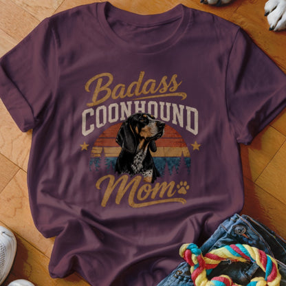 Burgundy t-shirt with "Badass Coonhound Mom" text and a dog portrait.
