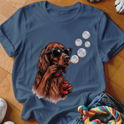 Blue t-shirt featuring a graphic of an Irish Setter wearing sunglasses and blowing soap bubbles.