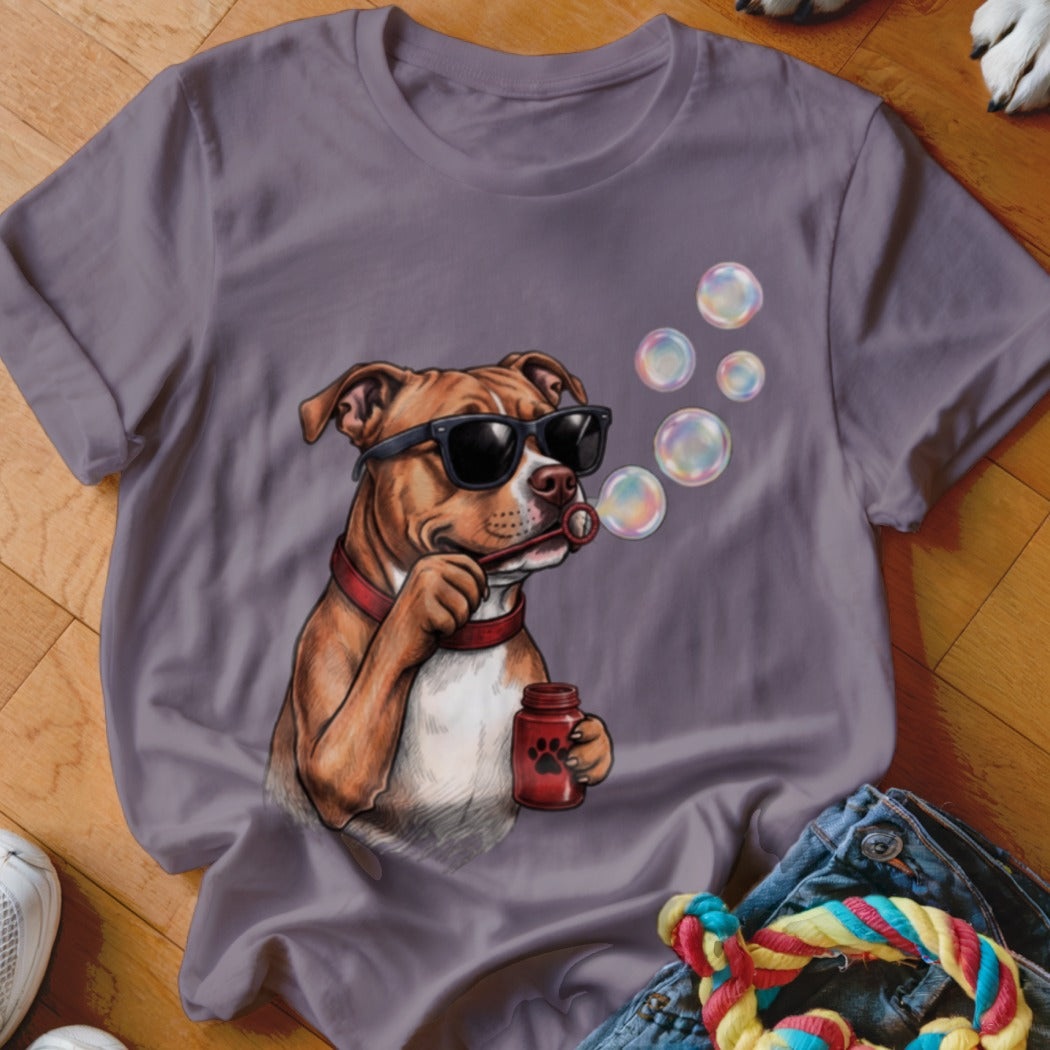 Grey crewneck t-shirt featuring a graphic of a brown dog wearing sunglasses and blowing bubbles.