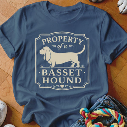 Blue t-shirt with white "Property of a Basset Hound" graphic featuring a Basset Hound illustration.