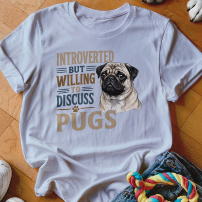 White t-shirt with pug graphic and text "Introverted but willing to discuss pugs".