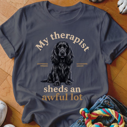 T-shirt with a black Cocker Spaniel and text "My therapist sheds an awful lot".