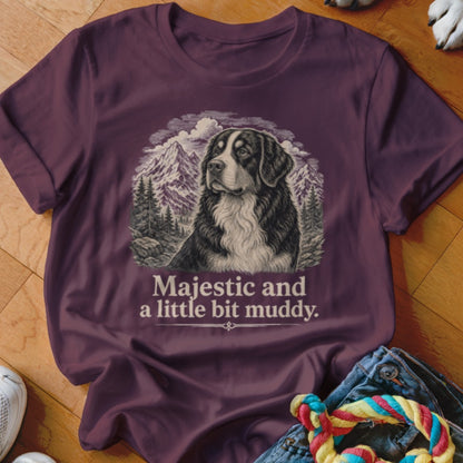 Bernese Mountain Dog with mountains and trees, reads "Majestic and a little bit muddy."