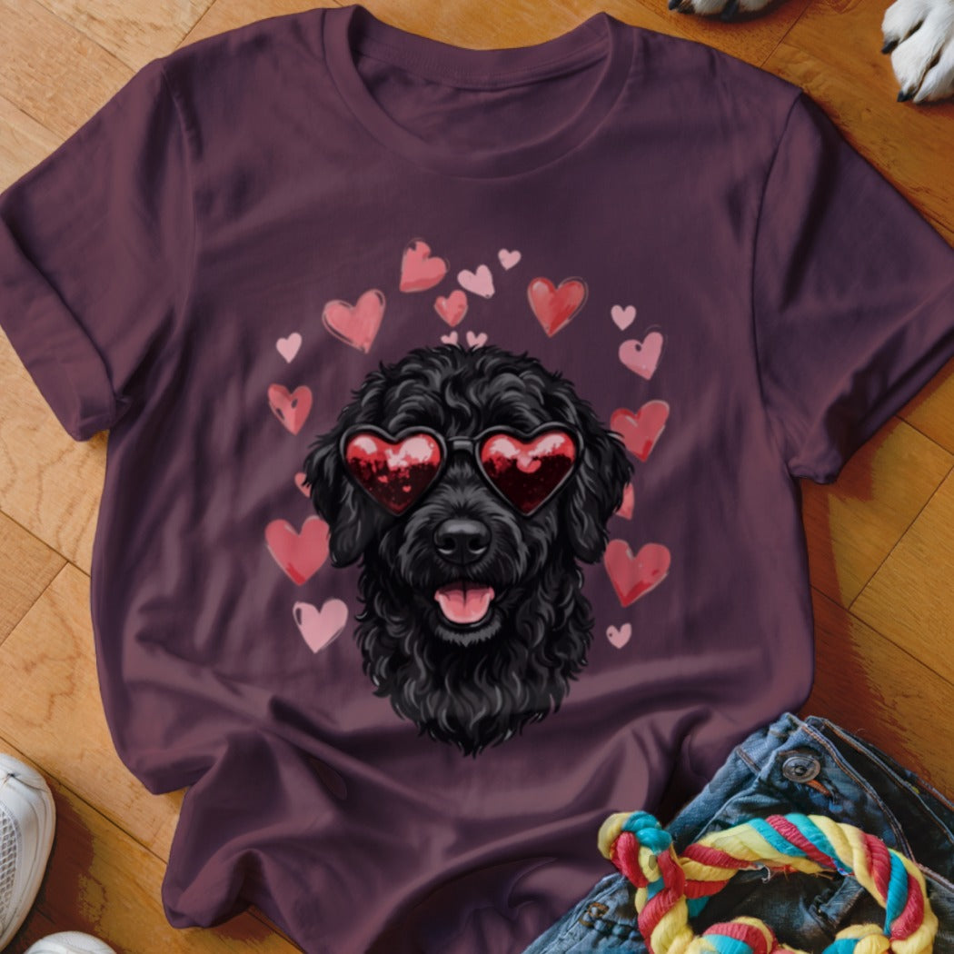 Maroon t-shirt featuring a graphic of a black poodle wearing heart-shaped sunglasses surrounded by pink hearts.