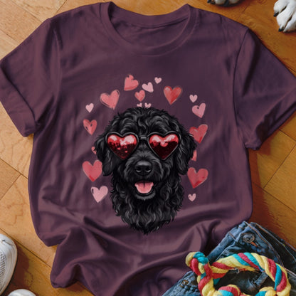 Maroon t-shirt featuring a graphic of a black poodle wearing heart-shaped sunglasses surrounded by pink hearts.