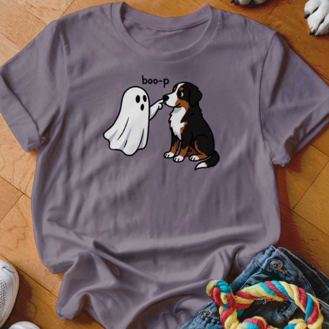 Bernese Mountain Dog puppy booping a ghost with "boo-p" text.