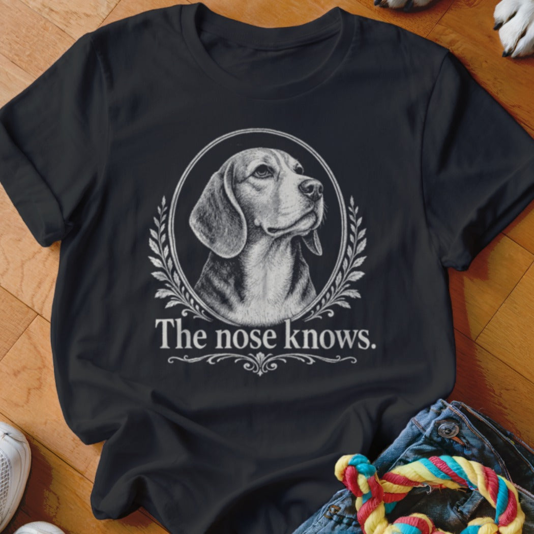 Black t-shirt with a beagle portrait and the text "The nose knows."