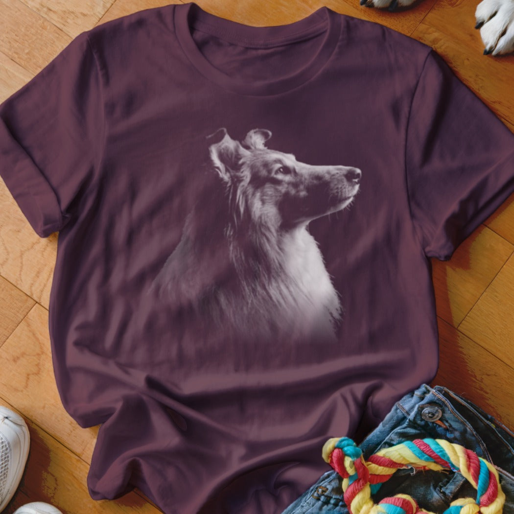 Maroon t-shirt with a black and white portrait of a collie dog.