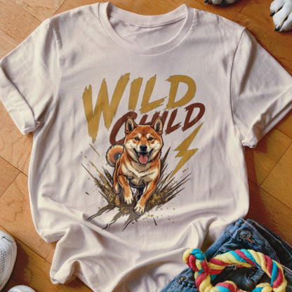 A cream t-shirt with a graphic of a running Shiba Inu and the text Wild Child.