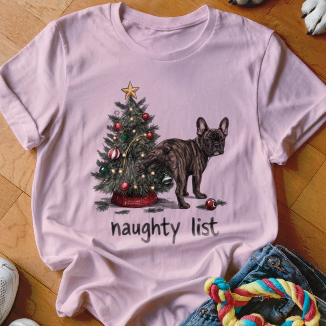 T-shirt with French bulldog near Christmas tree and text "naughty list".