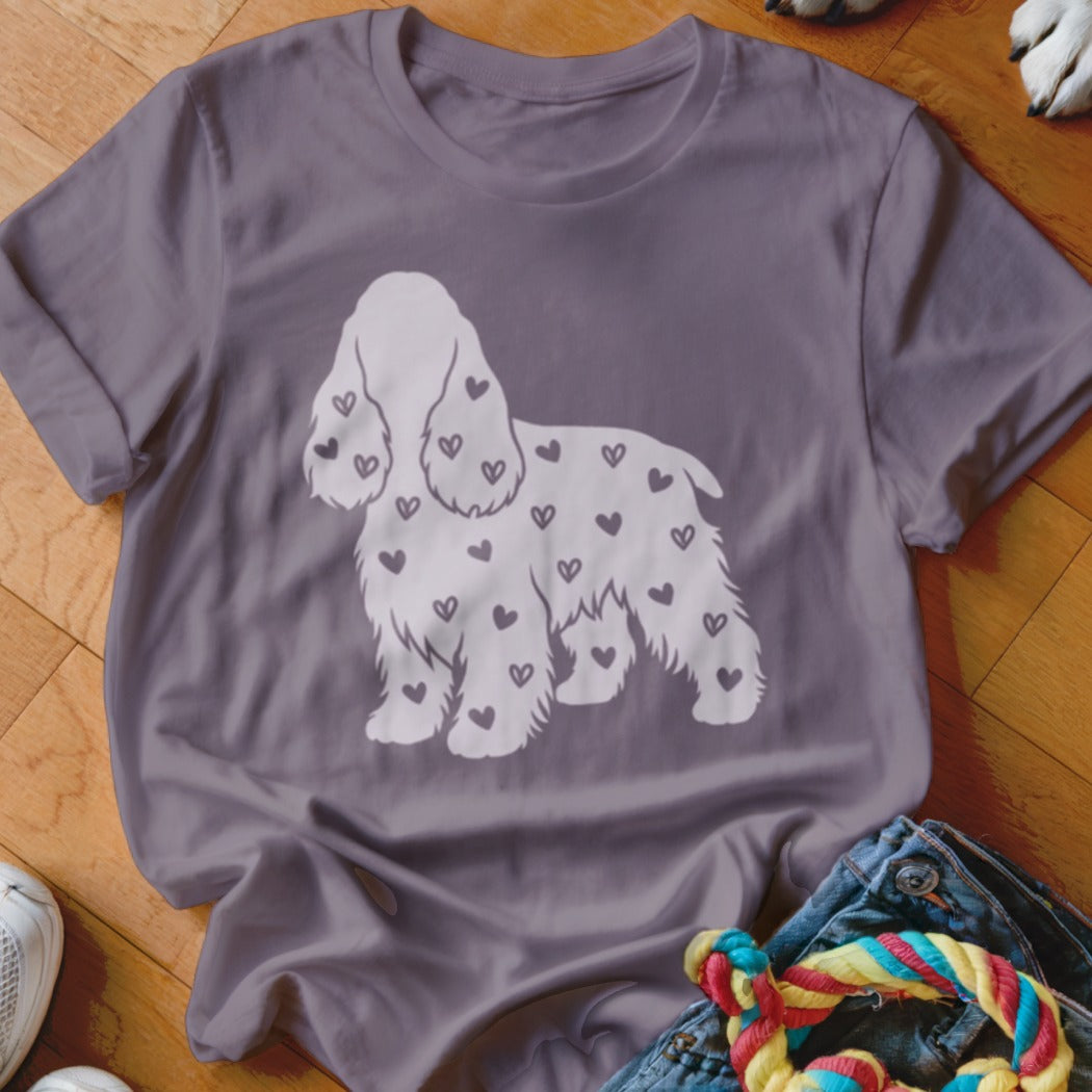 Grey t-shirt with a white cocker spaniel silhouette filled with small dark hearts.