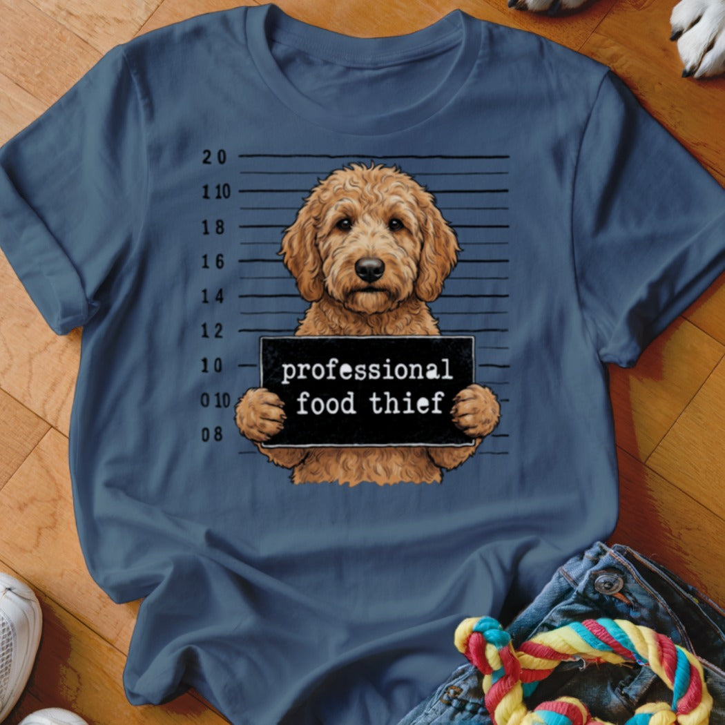Goldendoodle in mugshot holding "professional food thief" sign with height markers.