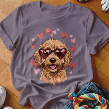 Gray t-shirt featuring an illustration of a fluffy brown poodle wearing heart-shaped sunglasses surrounded by pink hearts.