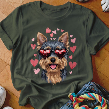 Dark green t-shirt featuring a graphic of a Yorkshire Terrier wearing heart-shaped sunglasses surrounded by pink hearts.