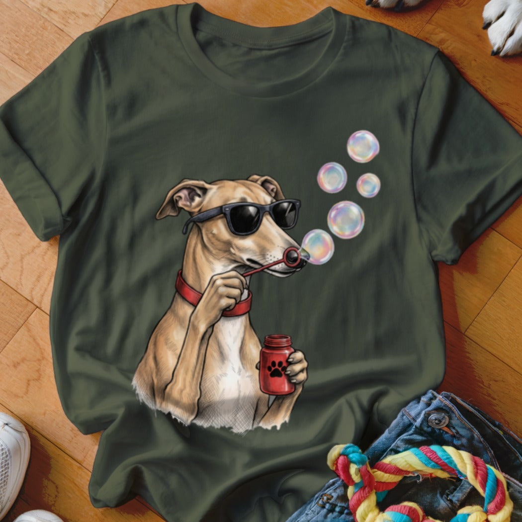 Olive green t-shirt featuring a graphic of a greyhound in sunglasses blowing soap bubbles.