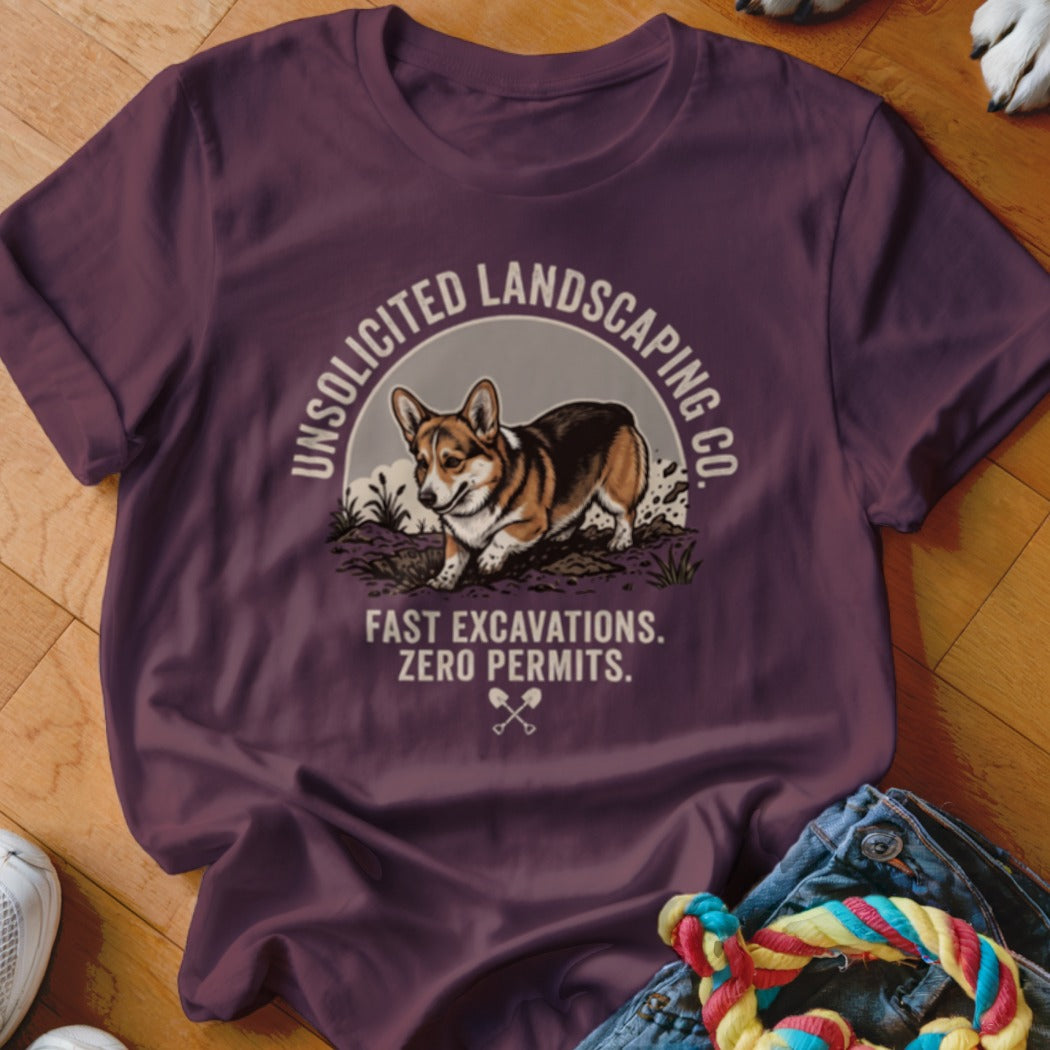 T-shirt with a corgi dog and text "Unsolicited Landscaping Co. Fast Excavations. Zero Permits."