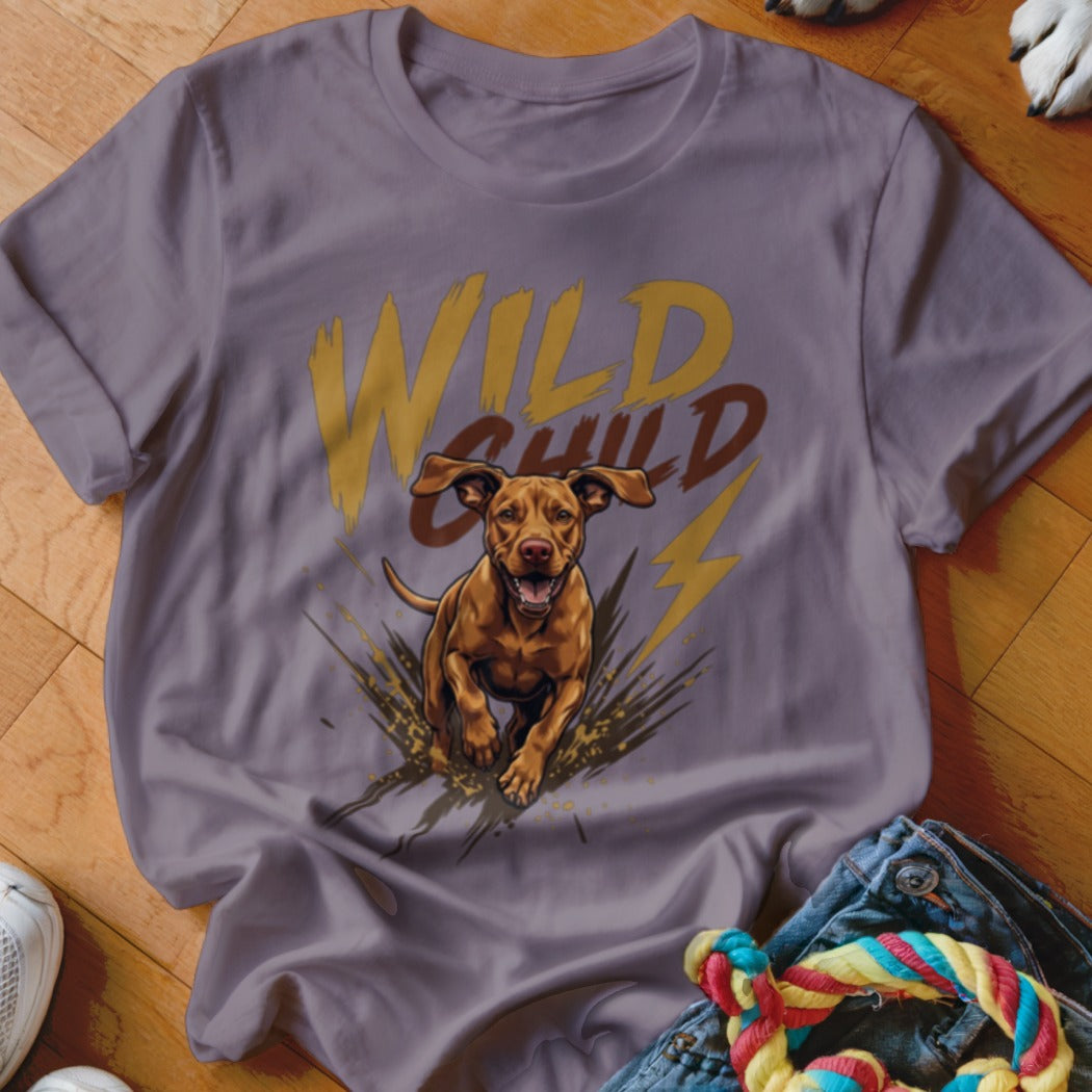 A grey t-shirt featuring a graphic of a brown dog running through mud with the text "WILD CHILD".