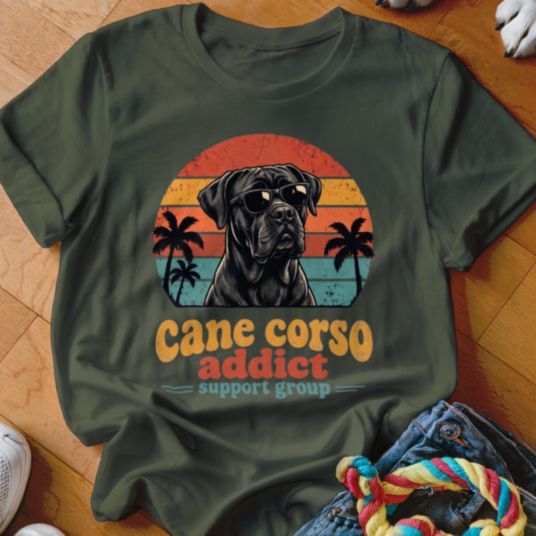 Dark green t-shirt with a vintage-style graphic of a Cane Corso wearing sunglasses against a sunset.
