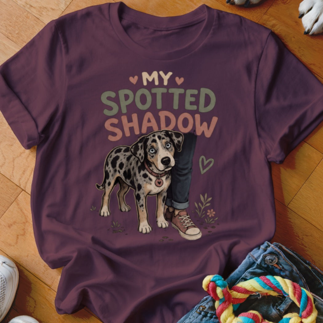Maroon t-shirt with "My Spotted Shadow" text and a spotted dog graphic.