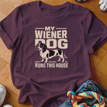 Maroon t-shirt with graphic "My Wiener Dog Runs This House" and a dachshund.