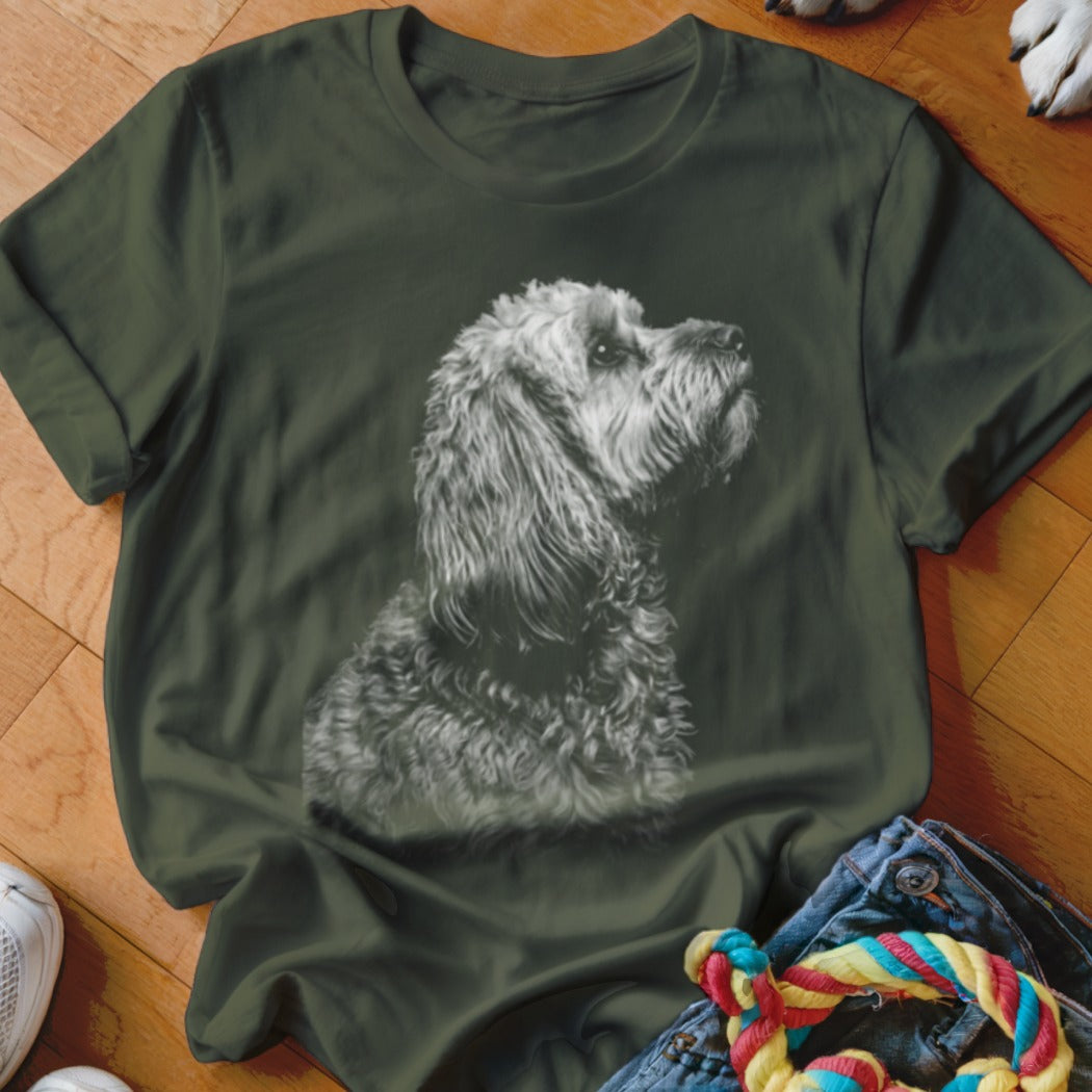 T-shirt with a black and white print of a fluffy dog's head and shoulders.