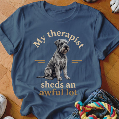 Blue t-shirt with a sitting schnauzer and text "My therapist sheds an awful lot".