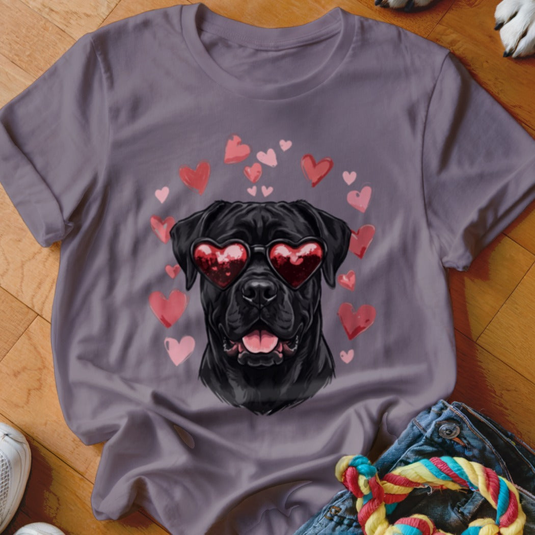 Mauve short-sleeve t-shirt featuring a graphic of a black dog wearing heart-shaped sunglasses surrounded by pink hearts.