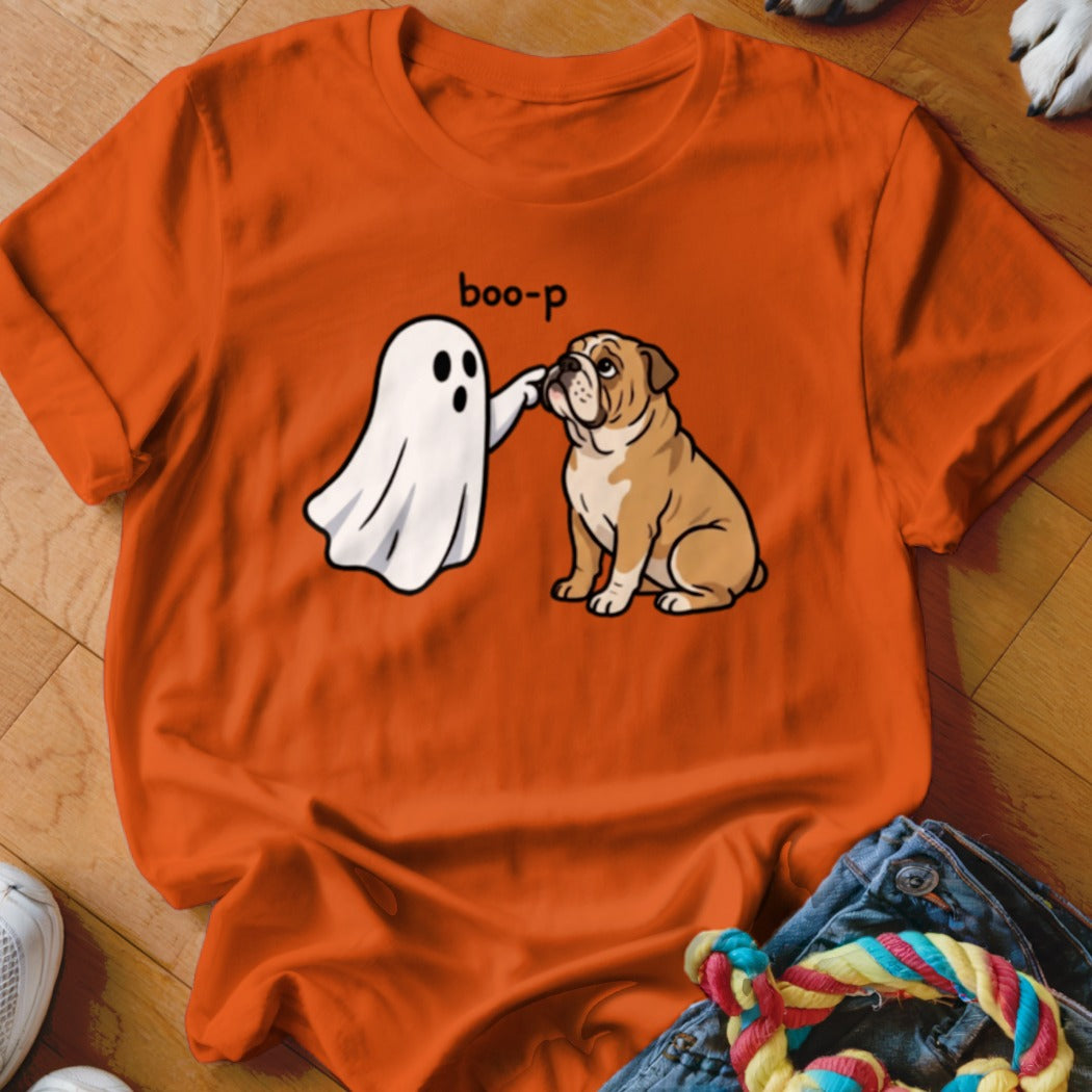 Ghost boo-p-ing a bulldog on an orange t-shirt.
