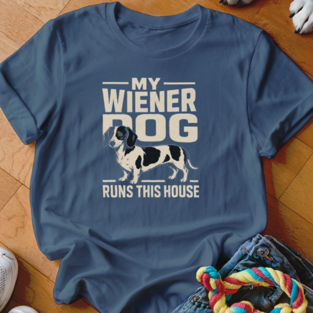 Blue t-shirt with "My Wiener Dog Runs This House" text and dachshund illustration.