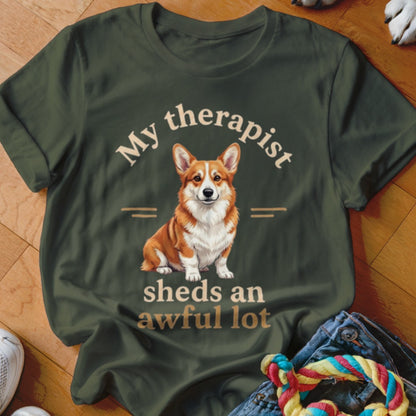 Green t-shirt with a corgi and text "My therapist sheds an awful lot".