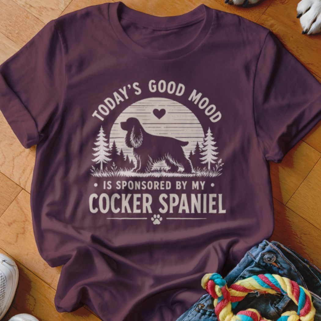 Maroon t-shirt with "Today's Good Mood is Sponsored by My Cocker Spaniel" graphic.