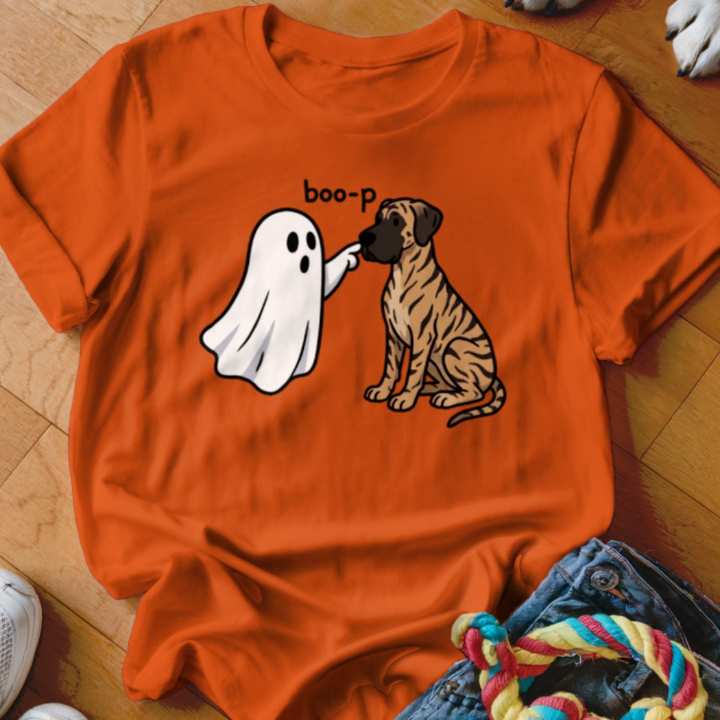 Orange t-shirt with a cartoon ghost booping a brindle dog with text "boo-p".