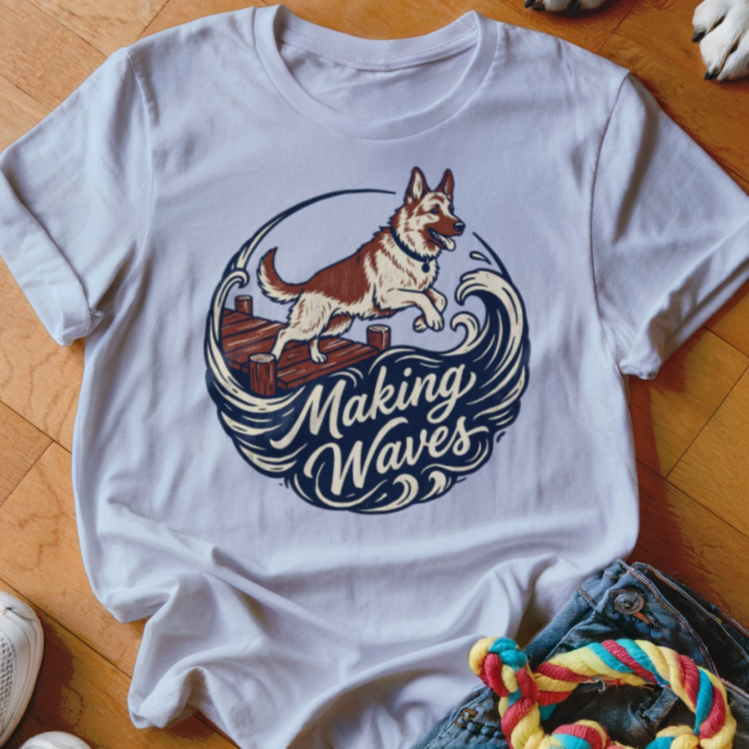White t-shirt featuring a dog jumping off a dock with "Making Waves" text.