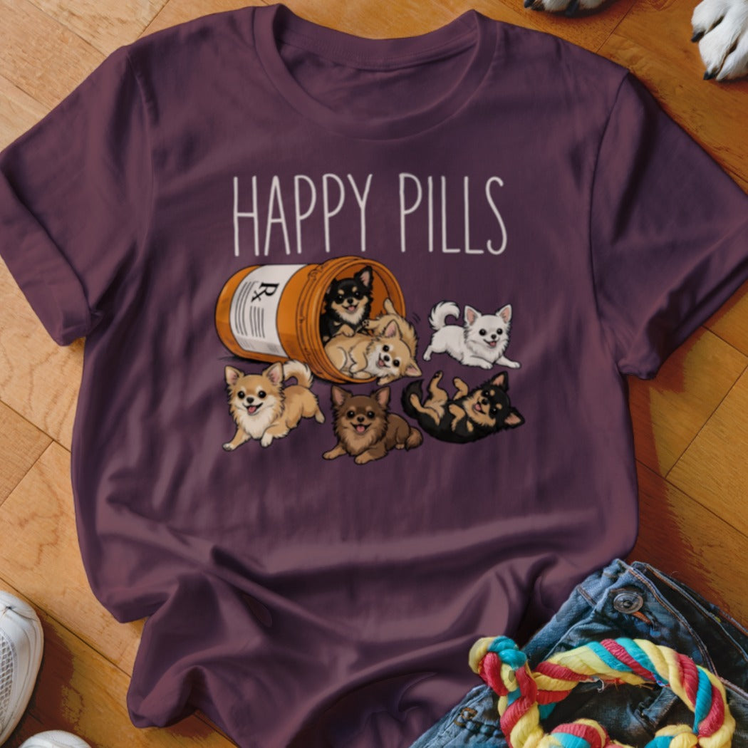 T-shirt with cartoon chihuahuas spilling from a pill bottle, "HAPPY PILLS" text.