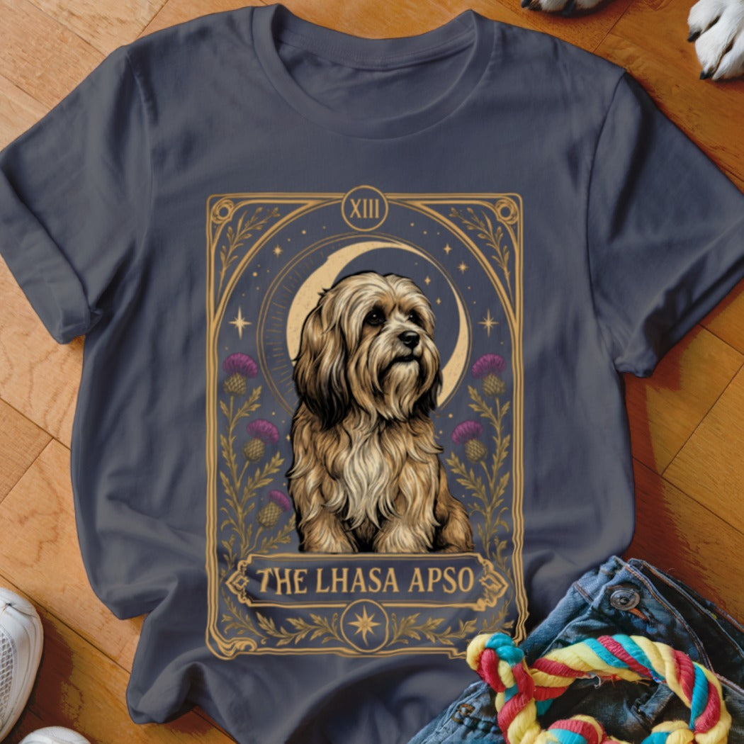 Dark gray t-shirt featuring a tarot-style graphic of a Lhasa Apso with purple flowers, a crescent moon, and the text The Lhasa Apso.
