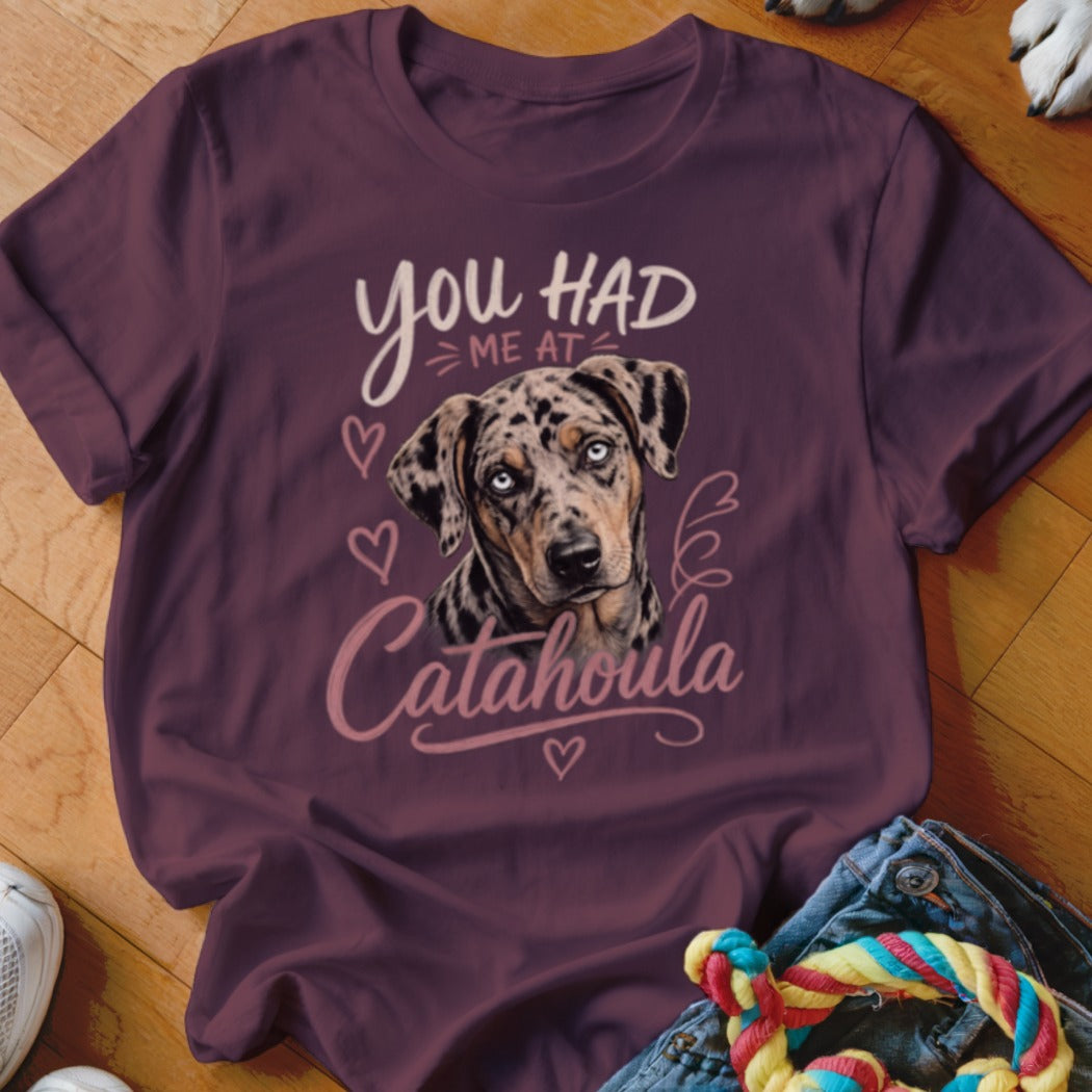 Catahoula dog graphic with text "you HAD ME AT Catahoula" on a maroon t-shirt.