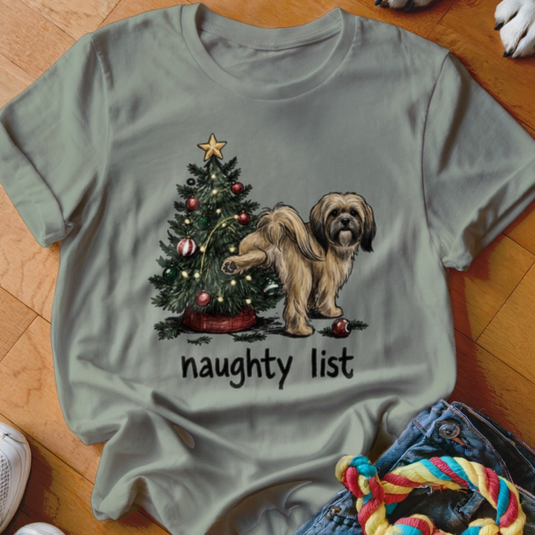Light gray t-shirt with a Christmas tree and a shaggy dog, reads "naughty list".
