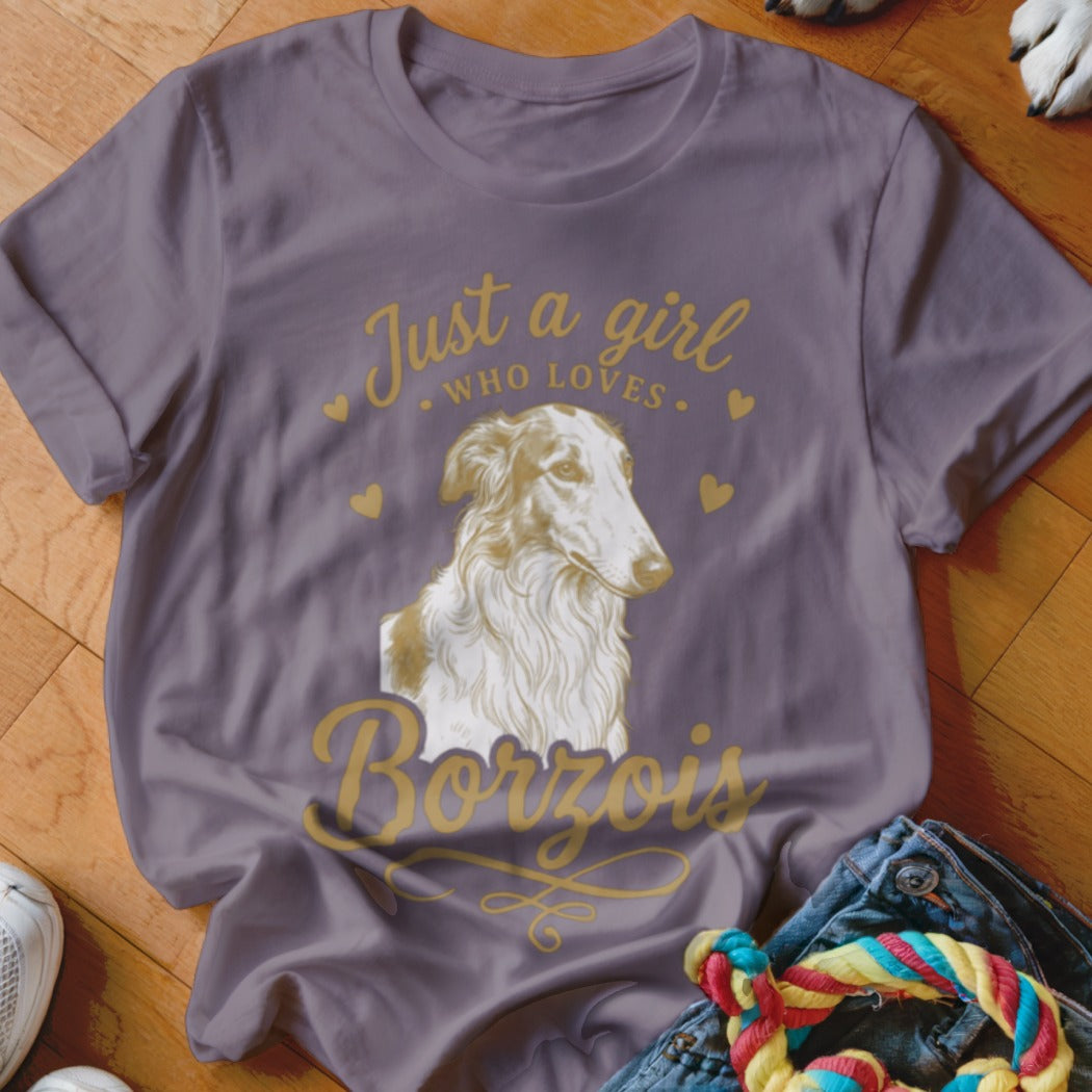 A purple crewneck t-shirt featuring a graphic of a Borzoi dog and text reading Just a girl who loves Borzois.