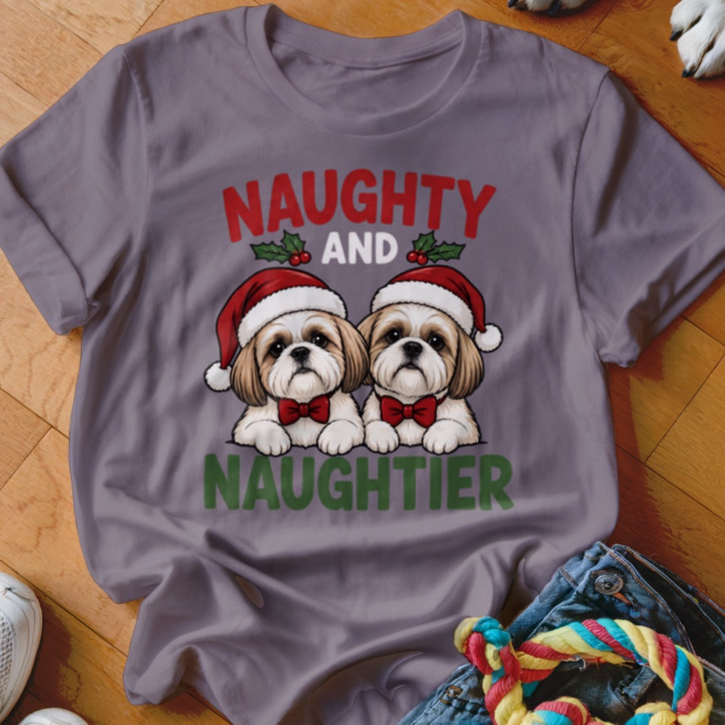 T-shirt with two dogs wearing Santa hats and the text "Naughty and Naughtier".